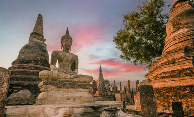 Ruins of old Buddha and temples of Wat Mahathat in Sukhothai historical park, Thailand, UNESCO site.