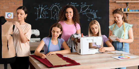 Poster - Young women during tailor's class in atelier