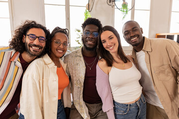 Wall Mural - portrait of young multiracial coworkers in modern office