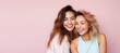 © dinastya - Two young beautiful girls hugging, laughing and smiling against a flat pastel pink background. Happy women girlfriends, portrait, copy space for text. Generative AI photo.