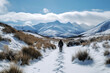 © Valerie Murray/Peopleimages - AI - Snow, hiking and travel with person in mountains for explore, environment and landscape. Ai generated, trekking and adventure with hiker walking in nature for tourism, destination or winter vacation