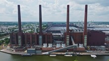 Drone Shot Of The Wolfsburg Volkswagen Factory , Wolfsburg , Germany  . The Wolfsburg Volkswagen Factory Is The Worldwide Headquarters Of The Volkswagen Group, And One Of The Largest Manufacturing Pla