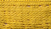 Close Up Of Knitted Wool, Close Up Of Yellow Woven Fabric, Golden Cloth Fibers Woven