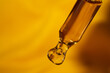 CBD Oil glass pipette. Oil close-up shot. Macro. THC. Cannabis sativa extract. Healthcare.	