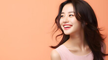 Happy Young Japanese, Asian Woman Against Orange Background
