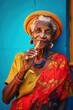 Colorful portrait of an old cuban woman smoking a cigar, travel and tourism in Cuba