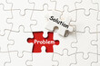 © Kenishirotie - Problem solution concept using white jigsaw puzzle