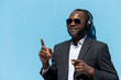 © zinkevych - Enjoyed african american man in sunglasses listening to music