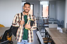 Happy Indian Male Student At The University