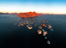 Panoramic Aerial View Of The Fishing Village Of Henningsvaer And Mountains At Sunset, Nordland County, Lofoten Islands, Norway, Scandinavia