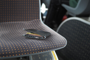  left wallet on a public bus seat 