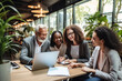 © Denis Yevtekhov - A multigenerational business team in a collaborative workspace, using digital devices and technology to enhance productivity Generative AI