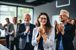 A portrait of a multigenerational business team celebrating a successful project, with smiles and applause Generative AI