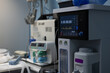 © Александр Лебедько - The gas anesthesia machine stands in a clean light surgery ready for operation. A ventilator ready for use in an empty operating room. Anesthesia equipment concept.