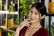 © Wavebreak Media - Portrait of happy, relaxed asian casual businesswoman smiling in office