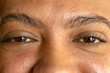 © Wavebreak Media - Close up of eyes of biracial casual businessman smiling