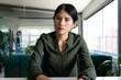 © Wavebreak Media - Serious asian casual businesswoman having video call and gesturing sitting at desk in office
