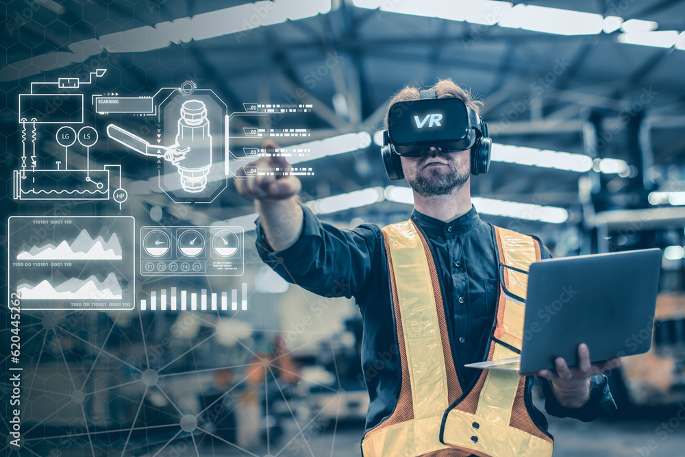 Engineer male using VR virtual reality technology in modern warehouse ...