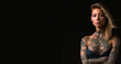 © annebel146 - Tattoo artist woman Portrait of tattooed full body with black background copy space, creative design
