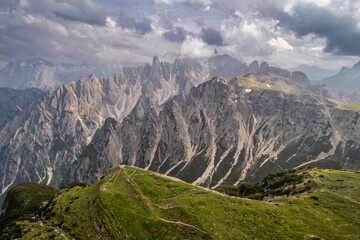 Wall Mural - Vlouds cover the Cadini groups' peaks in the Italian Dolomites