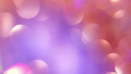 Wall Mural - Gold Bokeh Shimmers On Purple Background. Abstract colorful Christmas bokeh background. Defocused blurry circles in motion.