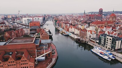 Wall Mural - Gdansk city in Poland with view on Motlava river. Historical center in old town in european city, aerial view. Panoramic skyline of modern european city