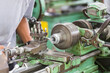 © jtairat - Operation of manual lathe machine.