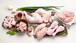 Various raw chicken meat portions.