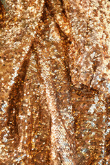 Wall Mural - Waves of brightly shiny fabric with gold sequins