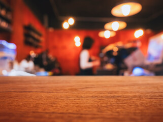 Wall Mural - Table top counter bar with people in cafe restaurant Blur background 