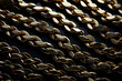 Massive golden braided chain on a dark background, Golden heavy metal chain texture, created with Generative AI