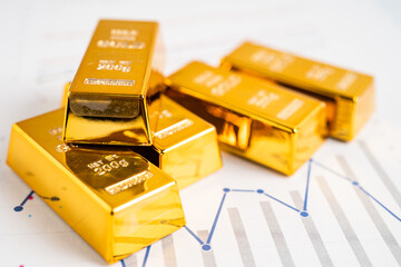 Gold bar on graph, economy finance exchange trade investment concept.