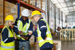 © DG PhotoStock - Diversity ethnicity of warehouse staff or engineer making a discussion together before start working, team of engineer in factory making a morning brief before working.