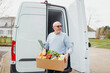 © Melissa Milis Photography/Stocksy - Senior at work: food delivery