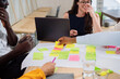 © Bruce and Rebecca Meissner/Stocksy - Office Brainstorming Meeting