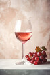© Agnes - A glass of wine and grapes on light rustic background. Still life with wine and grapes. Generative AI