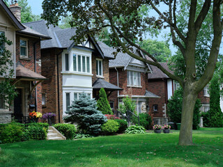 Poster - Street of traditional detached houses with front lawns