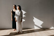 © Tania Cervian/Stocksy - Content diverse women looking away in studio together