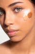 © Ángela Rober/Stocksy - Woman With Cosmetic Foundation Swab On Face