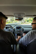 © Jordana Sheara/Stocksy - Father teaching teen son how to drive
