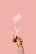 © Pixel Stories/Stocksy - Scissors cutting debit / credit card. Reduce / pay off debt concept.