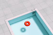 A Pool With A Red Float On The Water