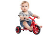 Baby on a tricycle isolated on transparent or white background. Fictional person. Generative AI