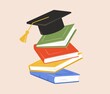 © Ivan Haidutski/Stocksy - Colorful books, academic hat on top.  Graduation, back to school idea