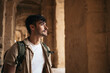 Backpacker man visiting El Djem roman amphitheater in Tunisia