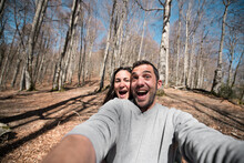 Excited Couple Selfie At The Mountain