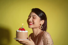 Happy Pretty Young Asian Female Hold Cake With Candle