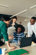 © Studio Firma/Stocksy - Group of People in Office