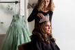 © Jayme Burrows/Stocksy - A Girl and Her Stylist Preparing for her Quinceanera