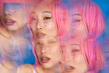 Multiple Exposure Of Young Asian Woman With Pink Hair 
